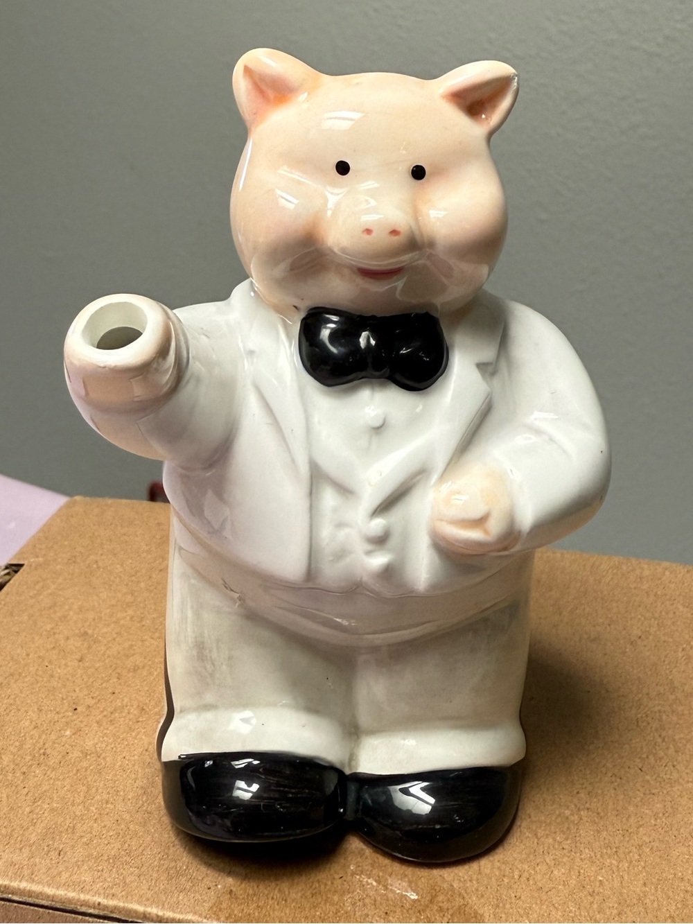 Vintage ceramic pig creamer in a tuxedo, likely from the "Piggies"